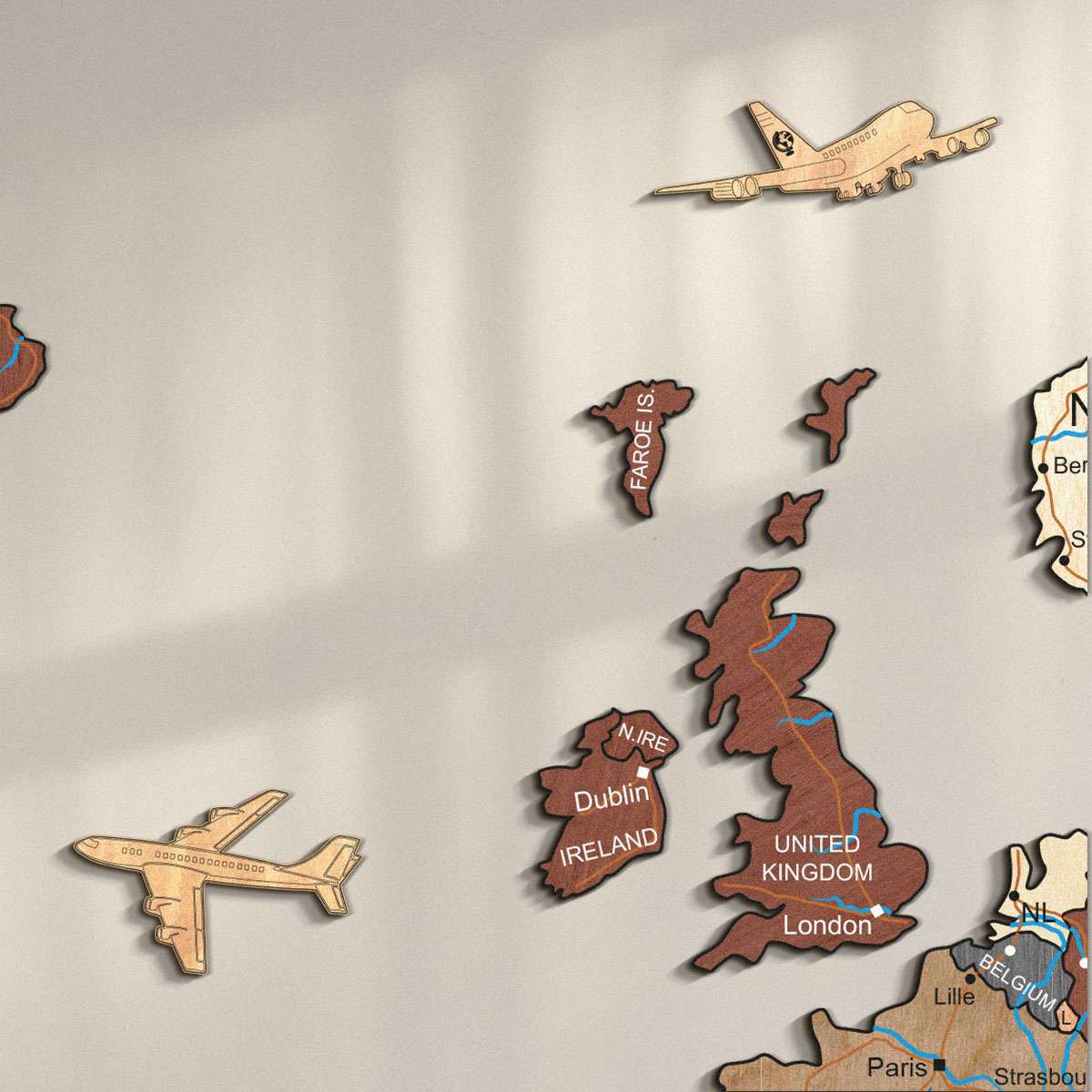 Colourful wooden boats, sailboats and planes