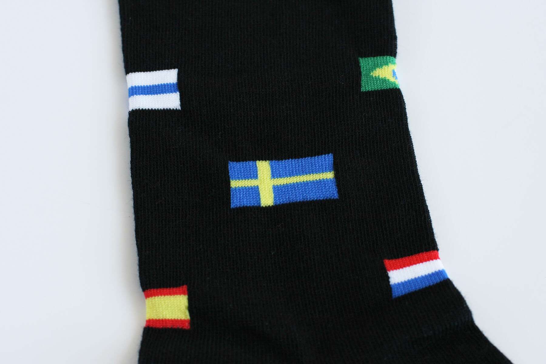 Skarpety unisex dla podróżników - flagi świata lub motywy miejskie