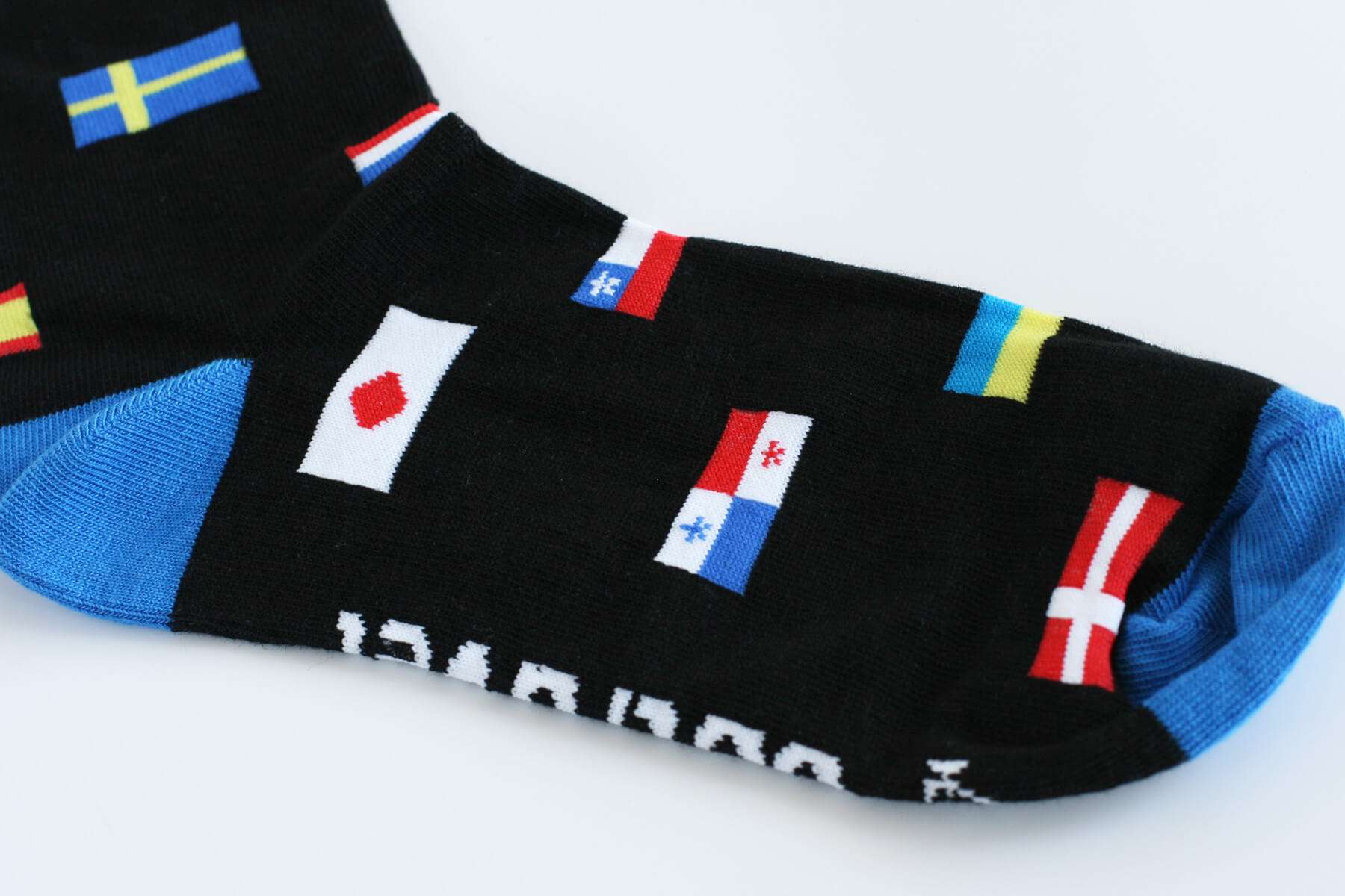 Skarpety unisex dla podróżników - flagi świata lub motywy miejskie